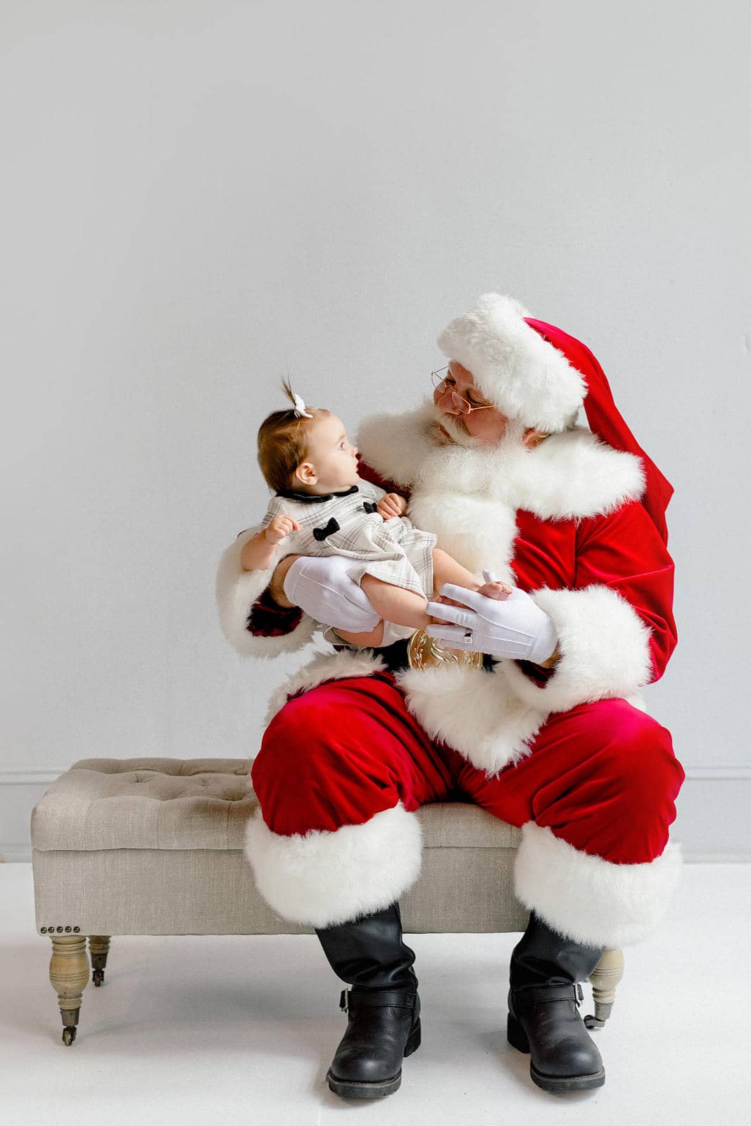 Santa and baby in photo studio